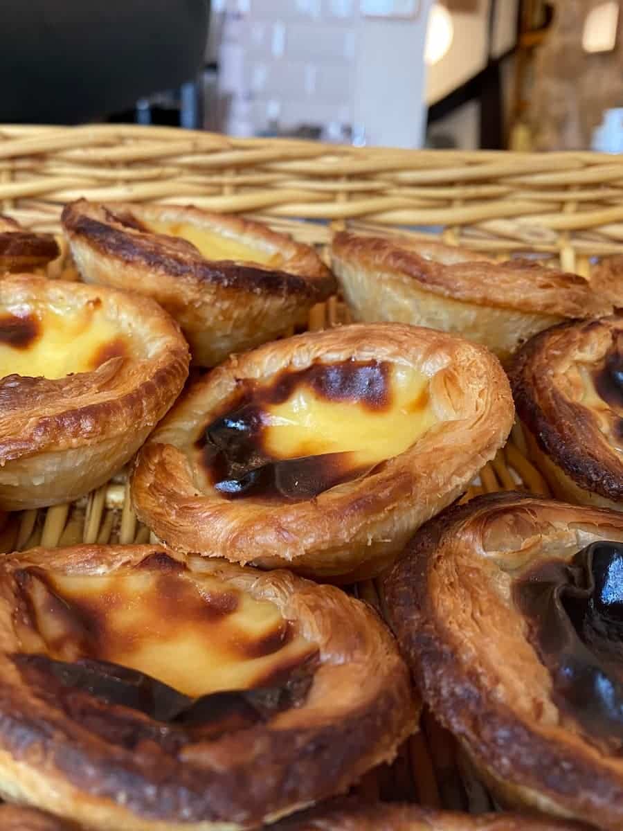 scorched custard tarts in a wicker basket