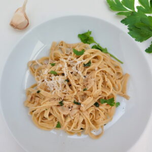 pasta bowl of egg noodles tossed in olive oil, butter, garlic, herbs and garlic