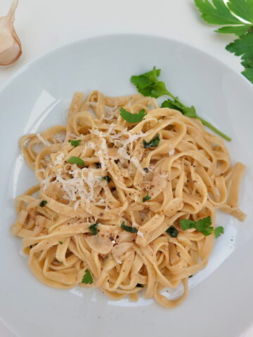 pasta bowl of egg noodles tossed in olive oil, butter, garlic, herbs and garlic