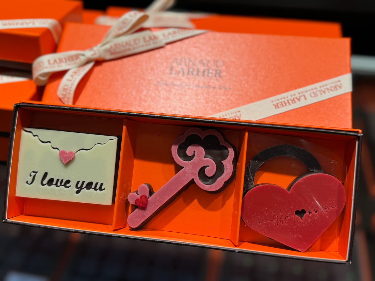chocolate valentine shapes of a key, a love letter and heart