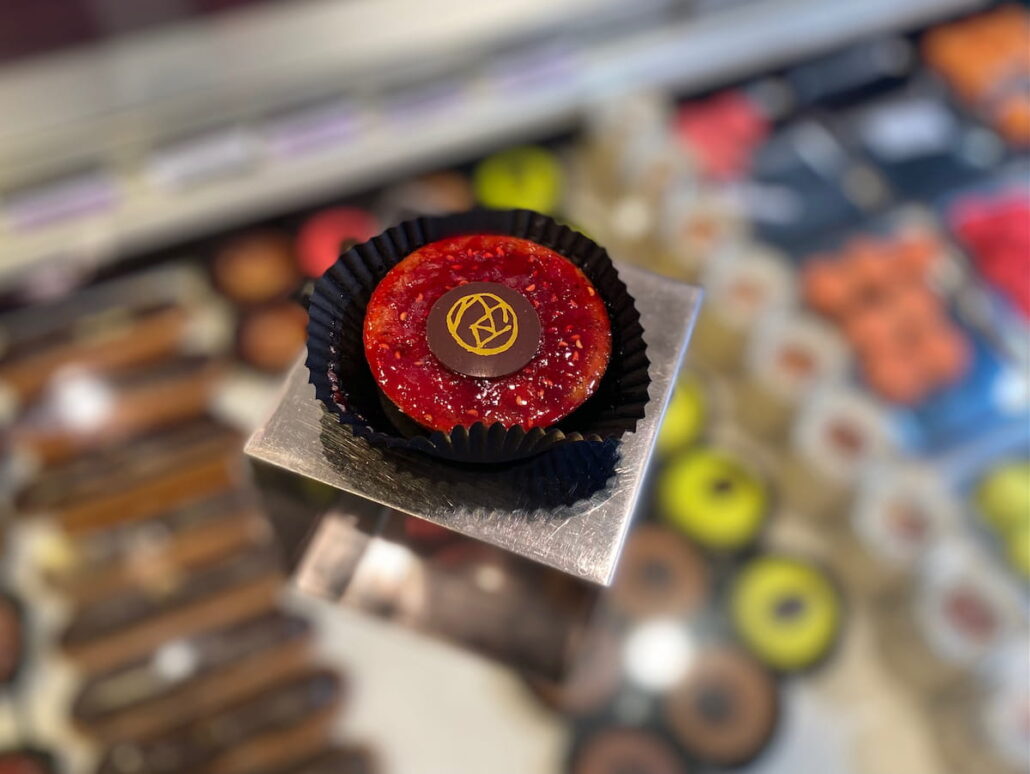 raspberry cake on glass counter