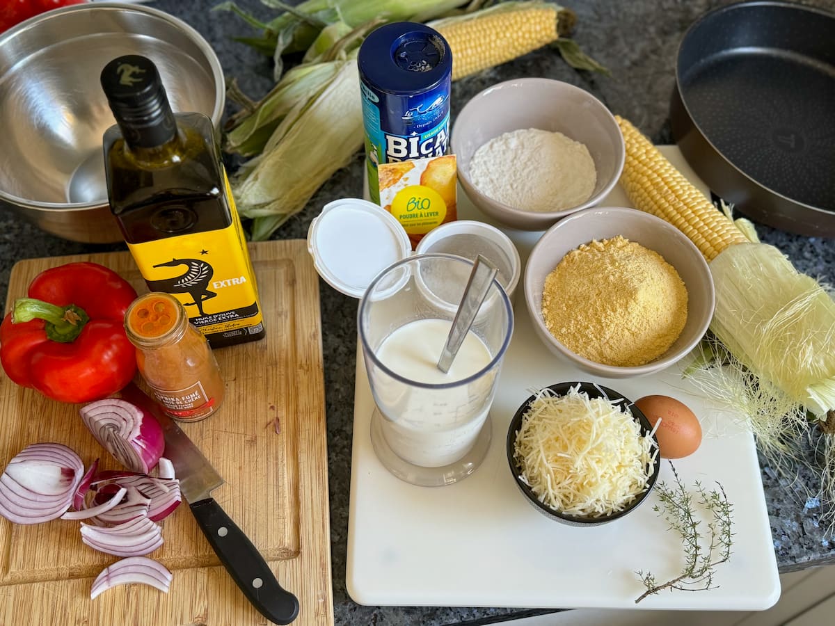 ingredients laid out in preparation to make homemade cheesy cornbread