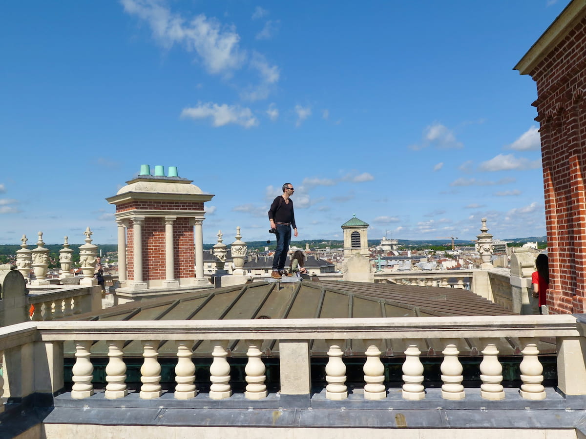 photographer on top of French castle roof
