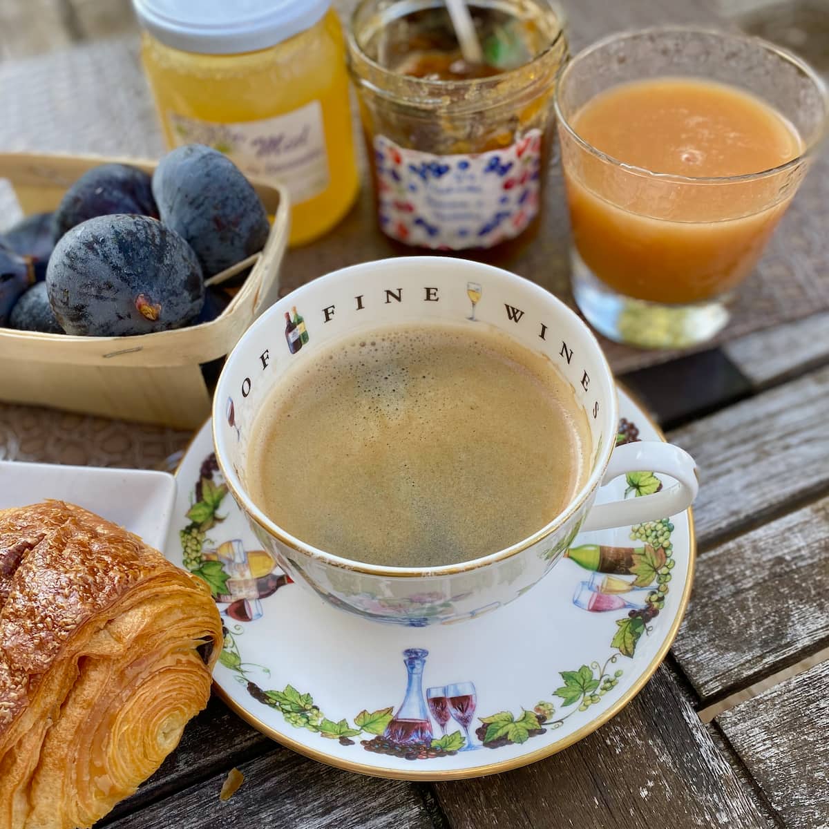 typical french breakfast with a large bowl of coffee
