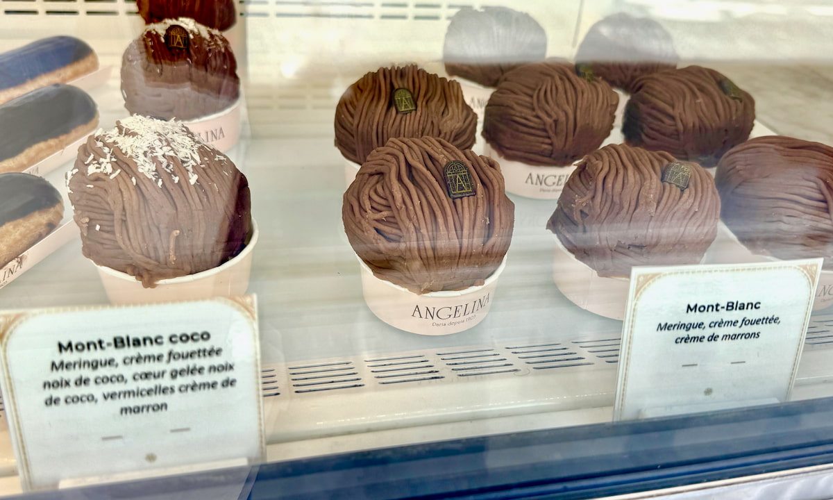 round cakes topped with chestnut paste in vermicelli form in a Parisian pastry shop