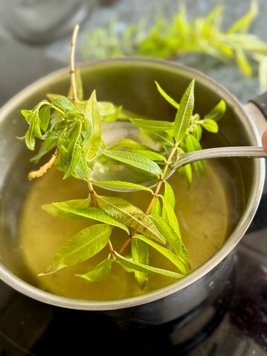 removing lemon verbena leaves from a simple poaching syrup