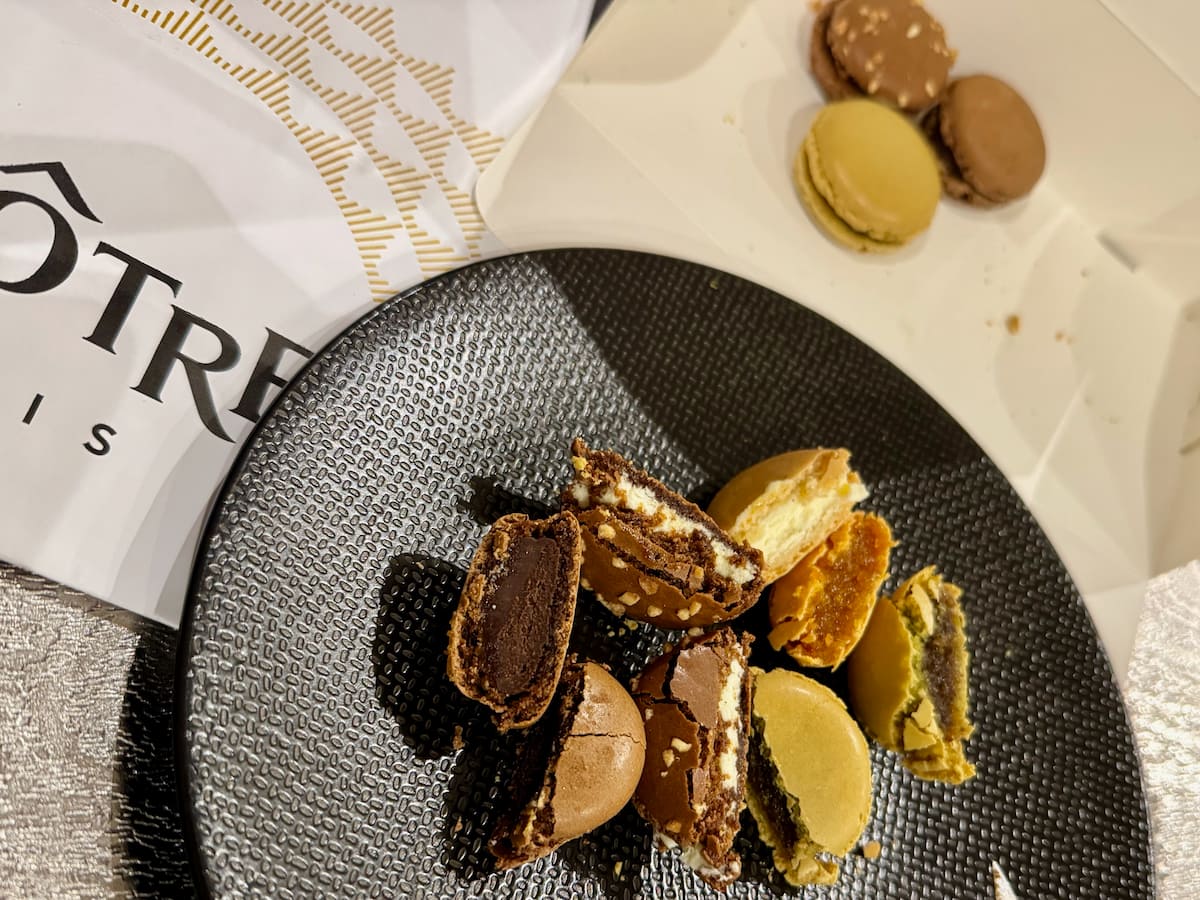 different flavours of macarons cut in two for a tasting from Lenotre Paris