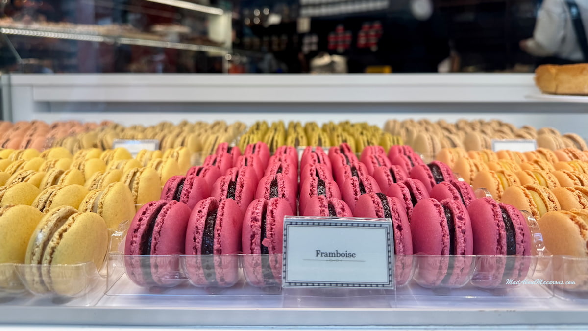 perfect raspberry macarons in a Parisian shop window