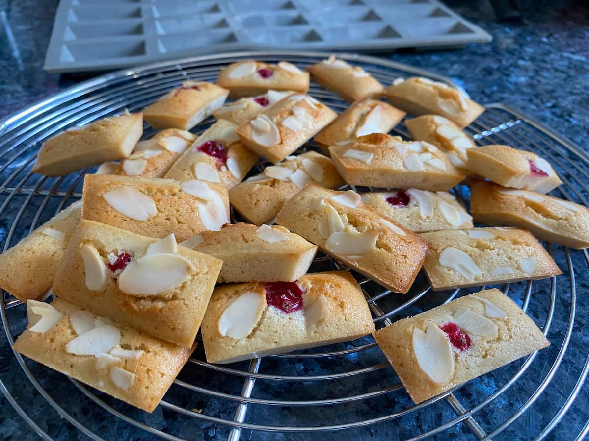 mini teacakes cooling on a rack out of the oven