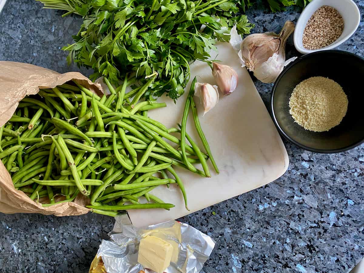 ingredients to make french sauteed green beans - with garlic, breadcrumbs, parsley and butter