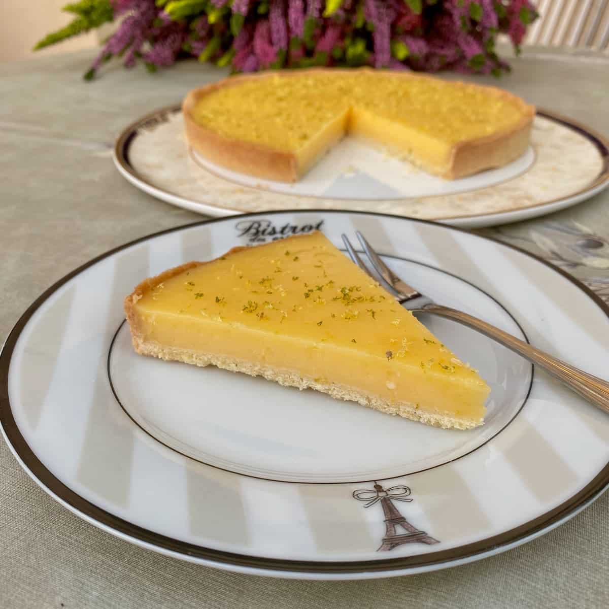 perfectly cut slice of French lemon tart