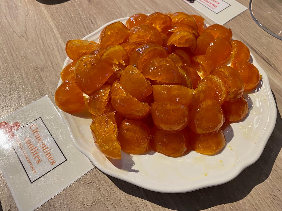 plate full of candied half clementines