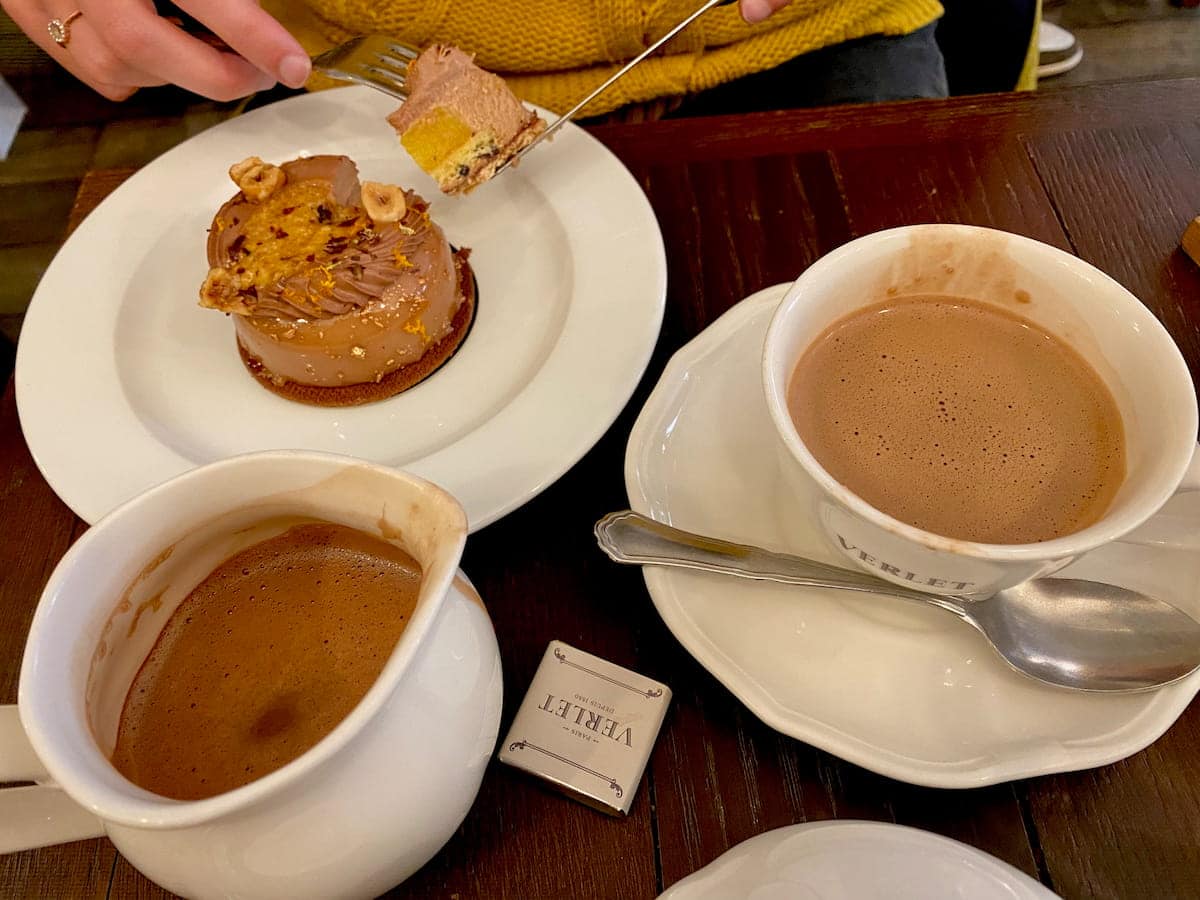 jug and cup of hot chocolate in a Parisian tearoom