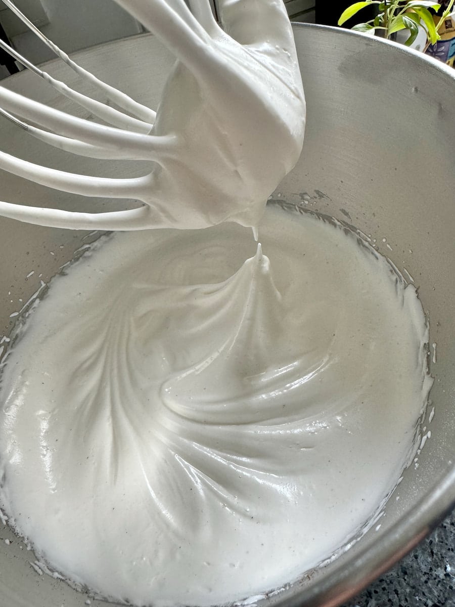 whipped up egg whites with vanilla until firm and glossy