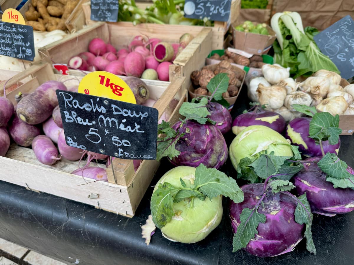 crate of blue meat variety of French radishes
