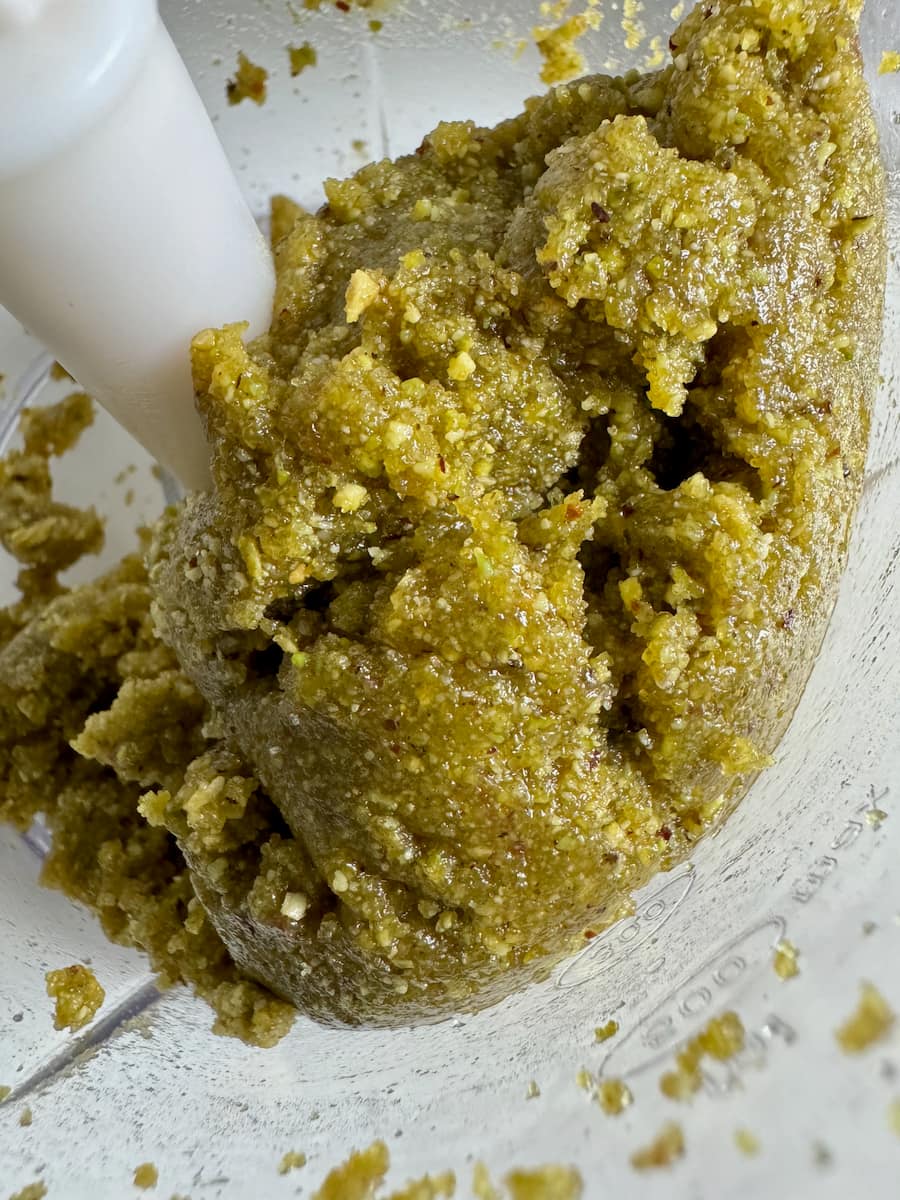 close-up of homemade pistachio paste made of pistachios, vanilla, little sugar and water