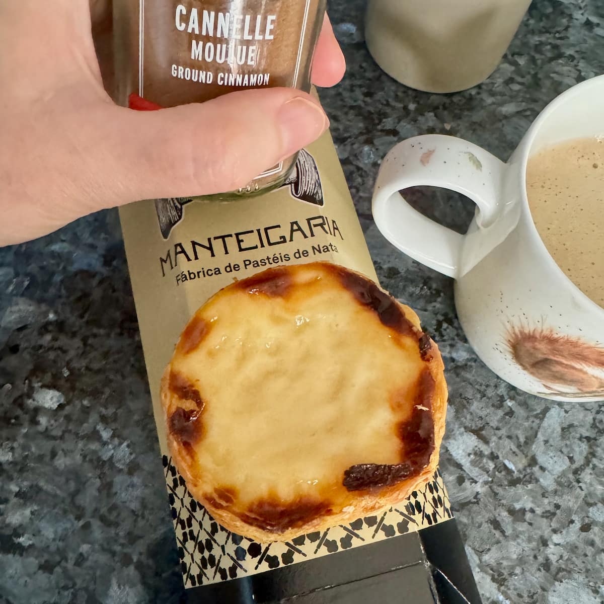 a scorched egg custard tart with cinnamon