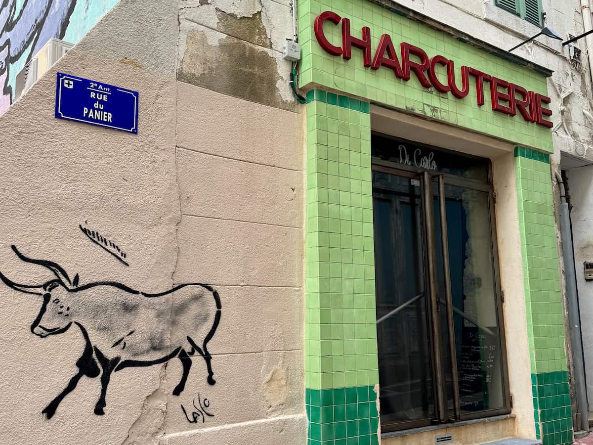 charcuterie shop in Marseille with cave style art