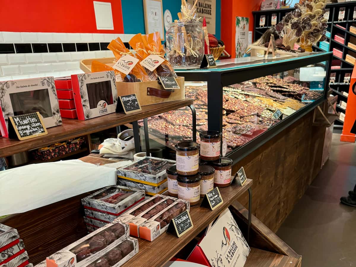 inside a chocolate shop in Marseille, with giant nutty slabs, bars and spreads