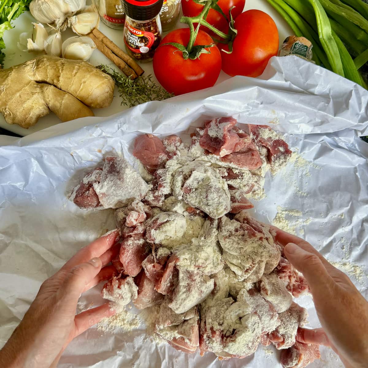 coating chicken pieces in plain flour