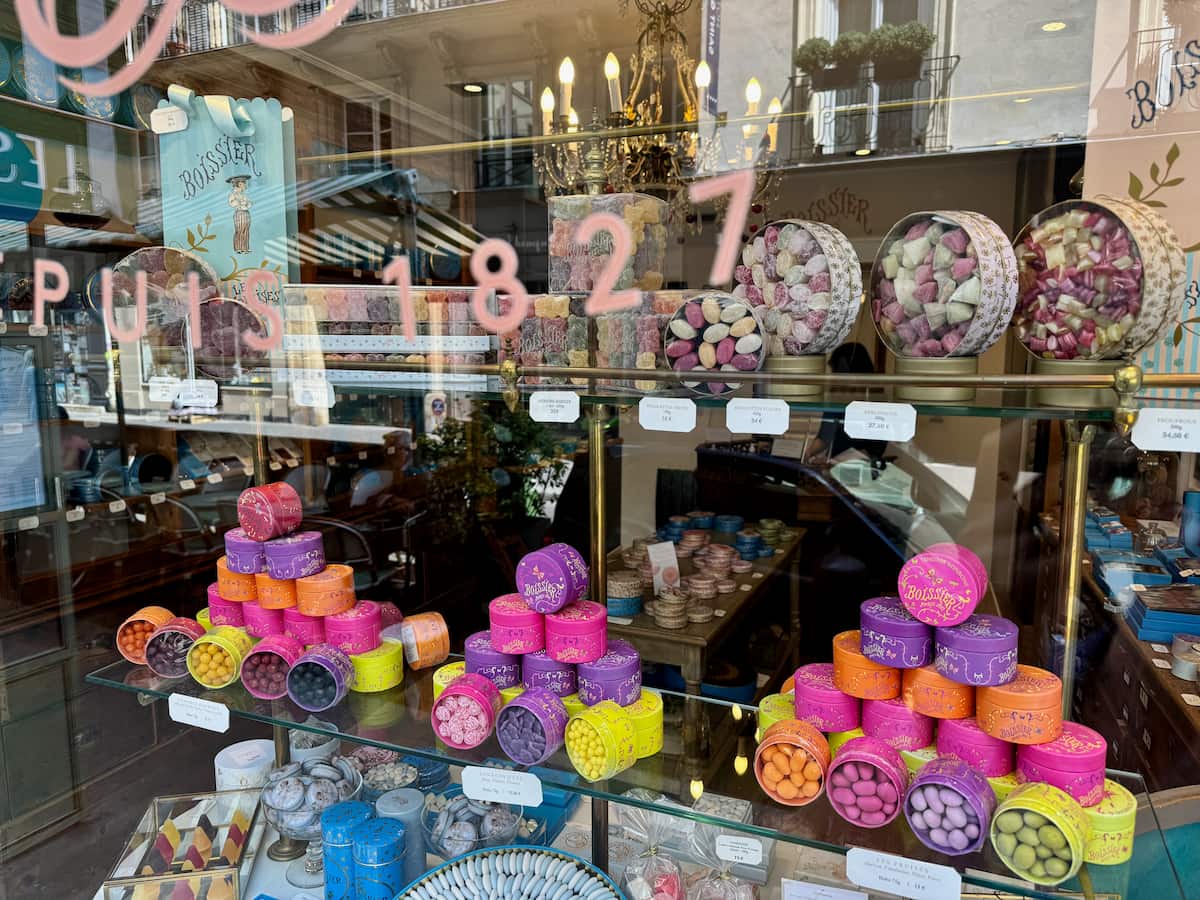 colourful window of pretty boxes of French confectionary