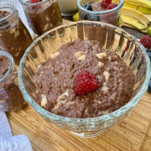 large dish of chocolate chia pudding with banana
