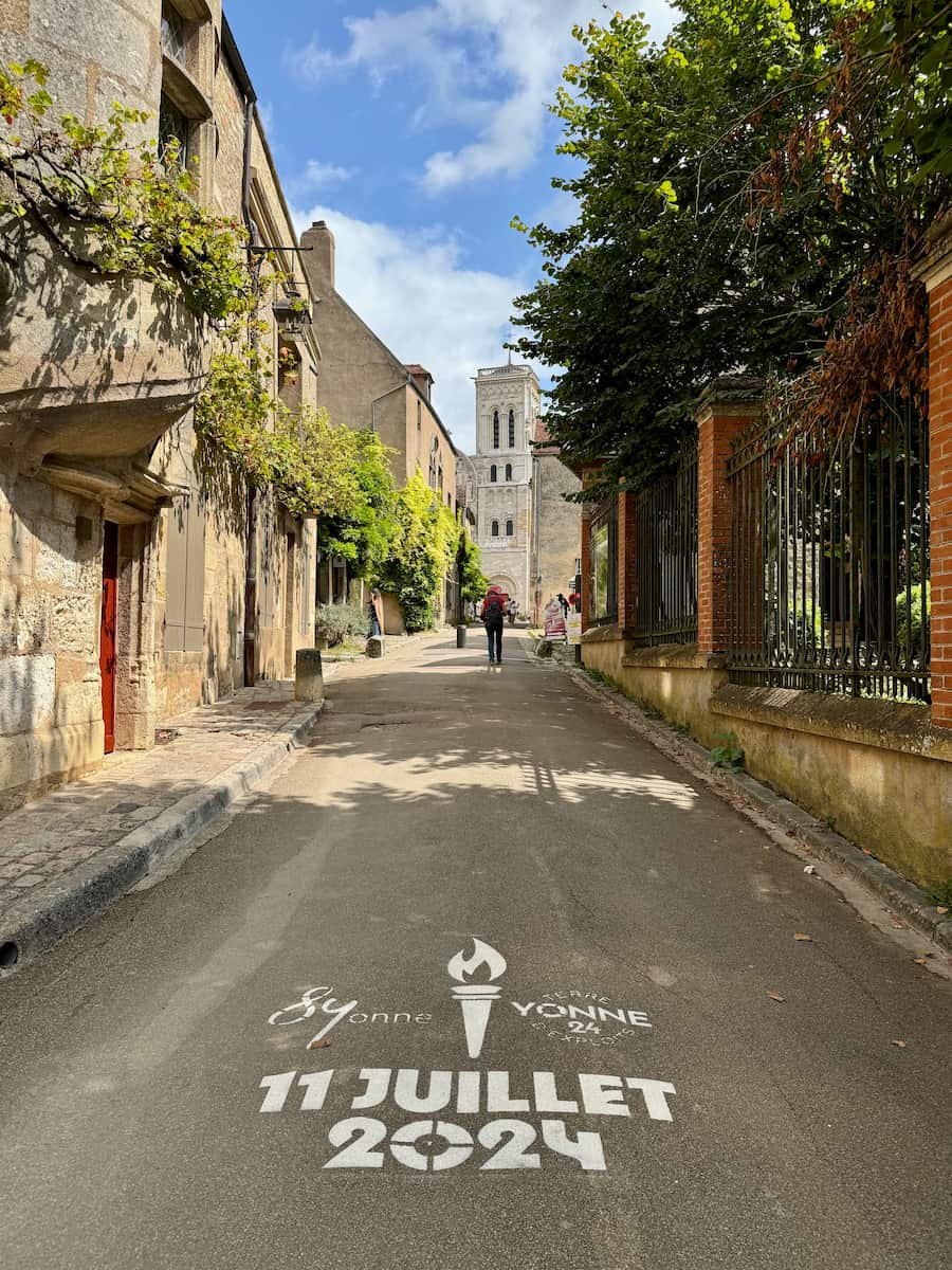 main street of Vezelay in Bourgogne with the Abbey at the top of the hill