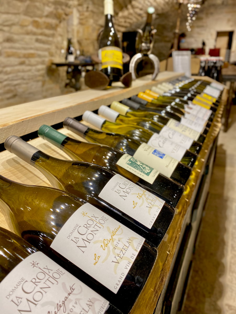 rows of Burgundy wine bottles particularly from the town of Vezelay France