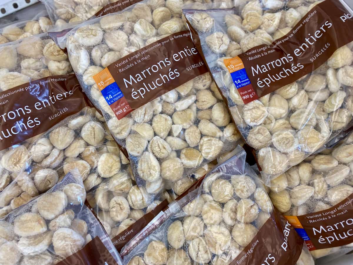 packs of frozen raw chestnuts in a French food store