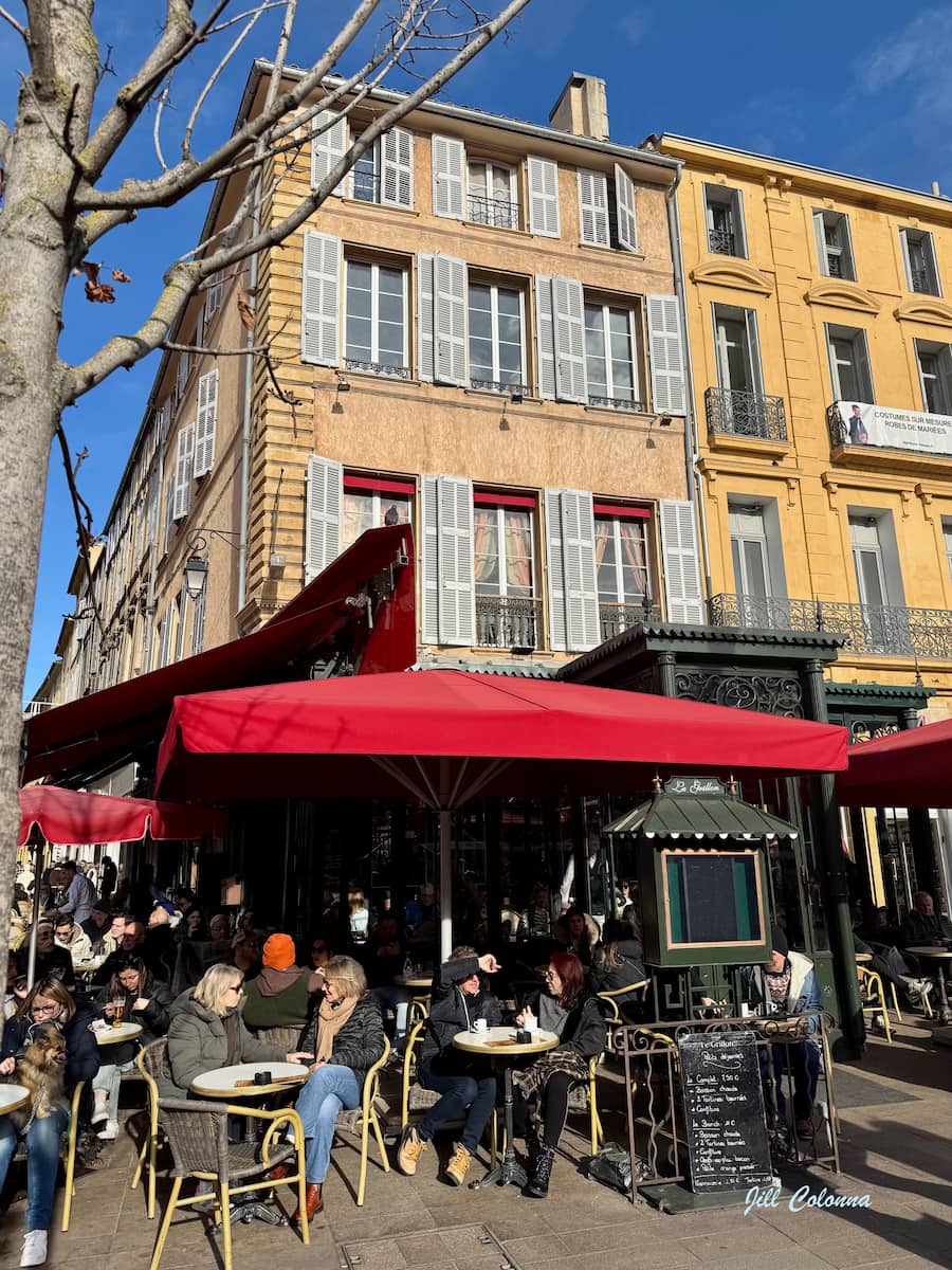 crowded café called le Grillon on Aix's main street