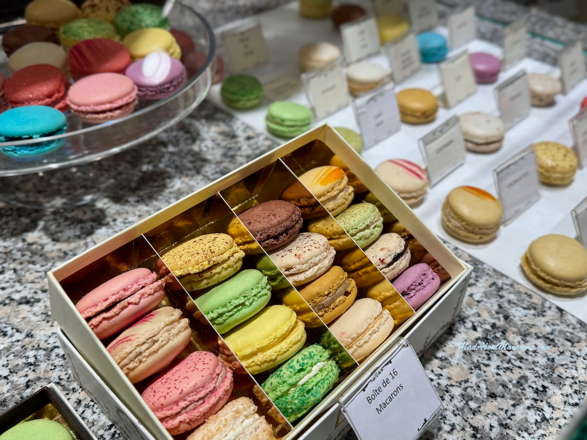 box of various coloured macarons at Foucher in Paris