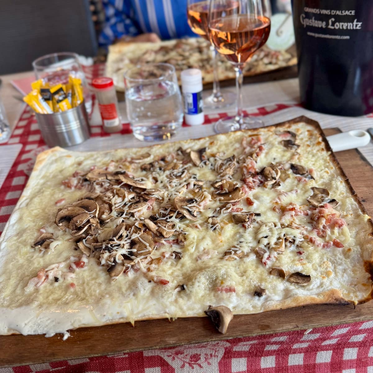 large flammekeuche or tarte flambée in one of the best Strasbourg restaurant to taste them